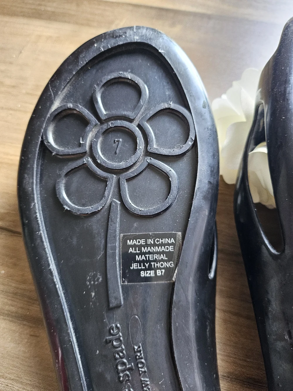 Kate Spade Black Jelly Slide Sandals with White Floral Accent